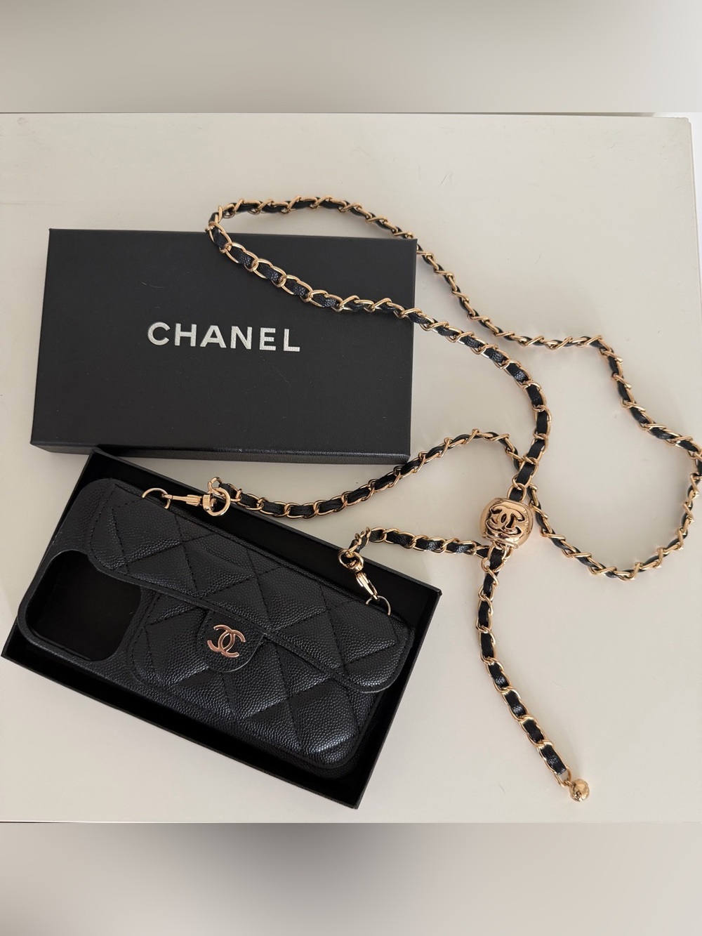 CHANEL iPhone 16 Pro Max Black Quilted Wallet-on-Chain with Gold Hardware